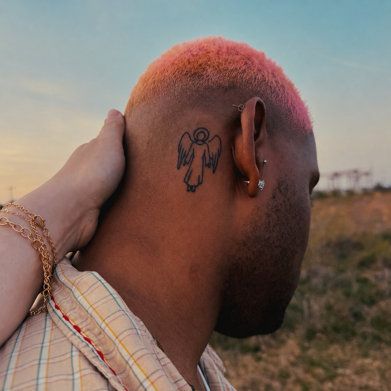 Saint Jules pink hair angel tattoo photo